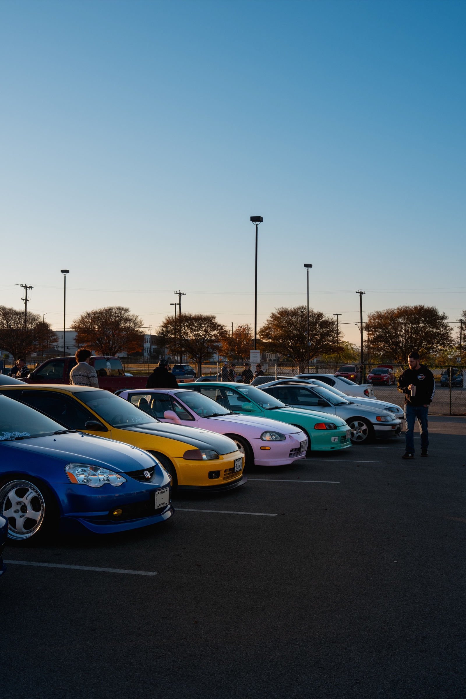 Colorful Honda lineup at sunset